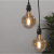 Glödlampa LED Amber E27 G125 2000K 80lm